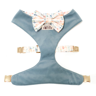 Blue velvet reversible dog harness with mullti-color oval dot print bow tie.