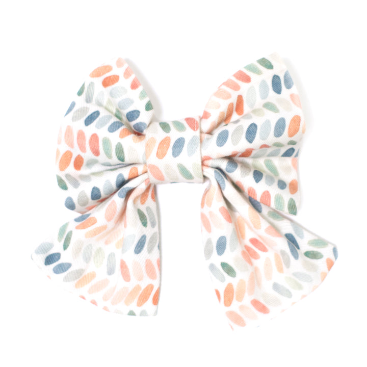 Multi-color modern dot print sailor dog bow.