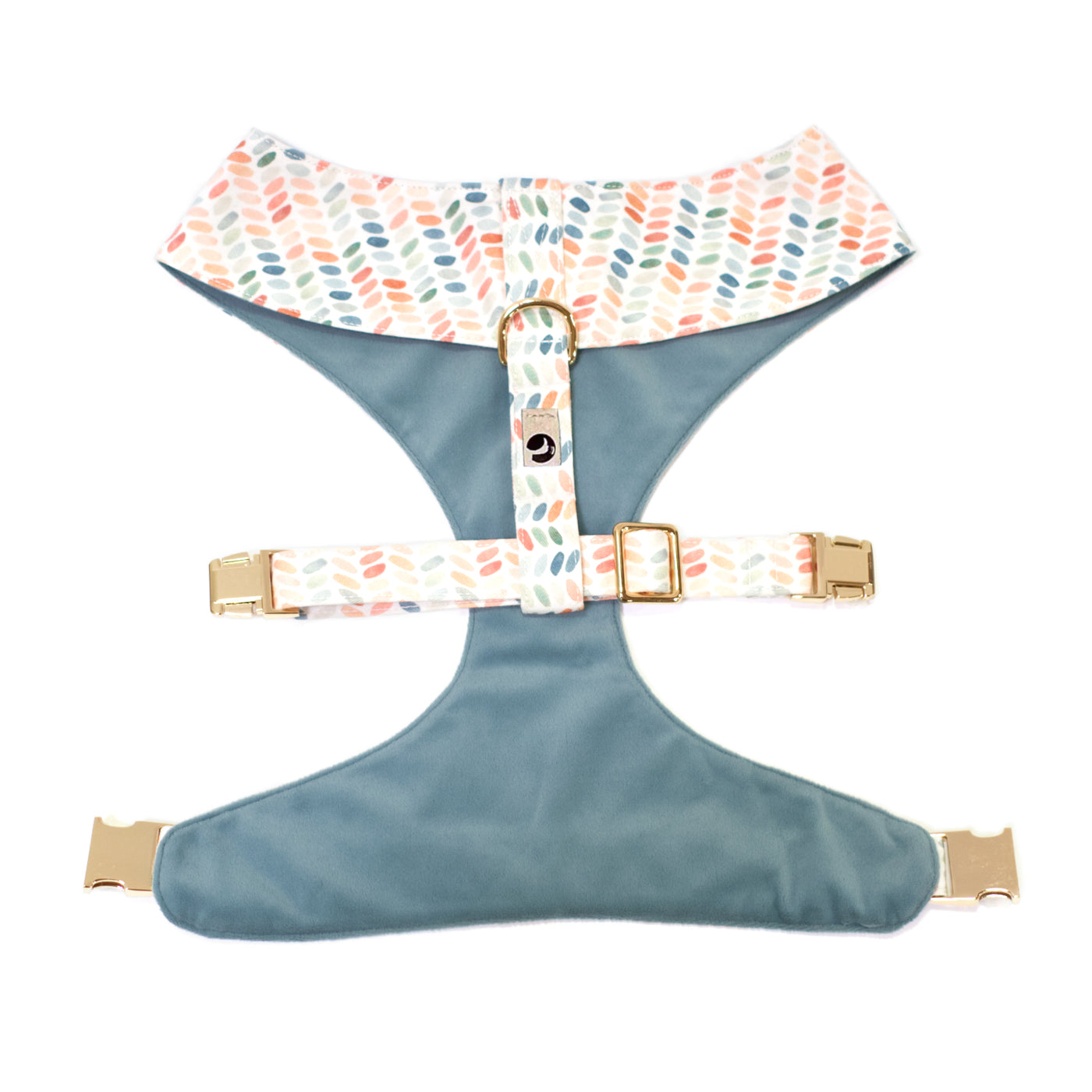 Reversible dog harness in polka dot print show from back/top.
