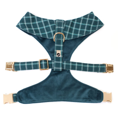 Top/back view of reversible dog harness with gold hardware in dark teal windowpane plaid and velvet 