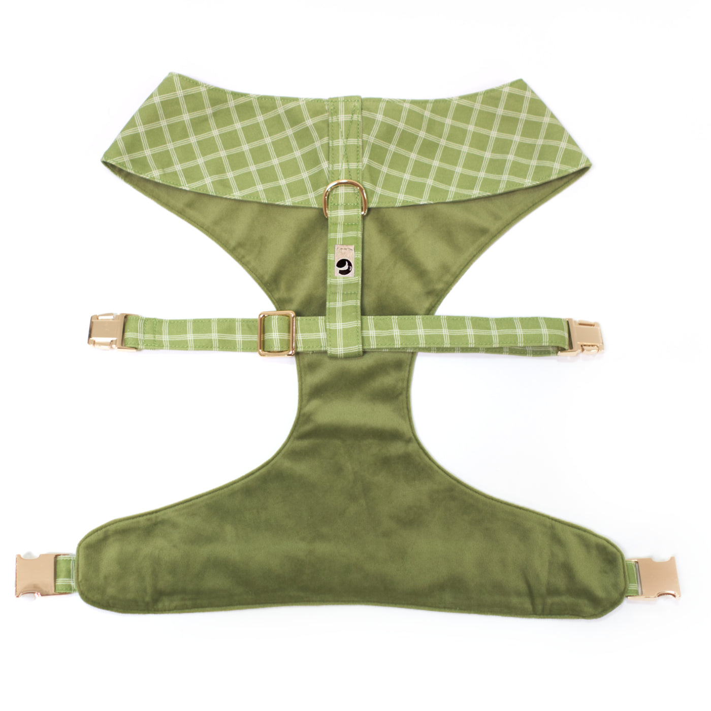 Top/back view of reversible dog harness with gold hardware in moss green plaid and velvet