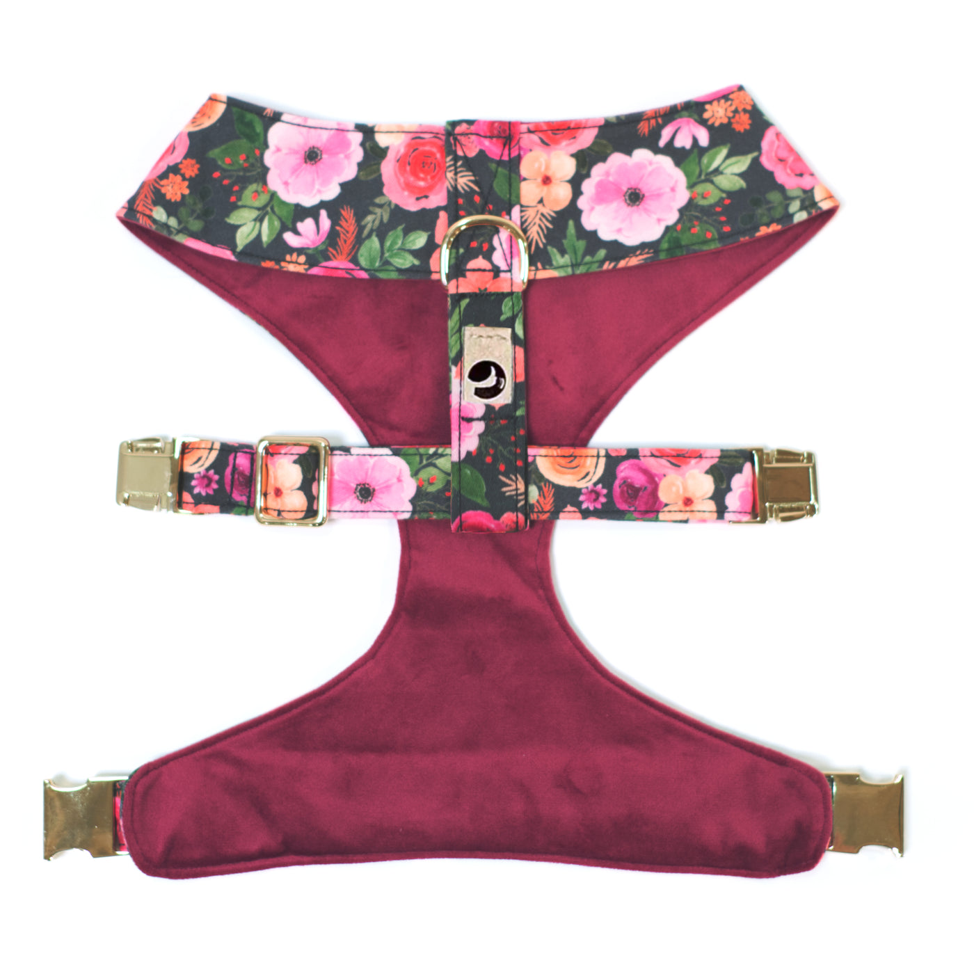 Top/back view of floral and velvet reversible dog harness in pinks 