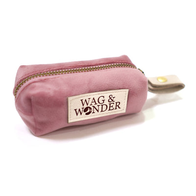 Blush pink velvet dog poop bag holder with zip closure and vegan leather loop attachment