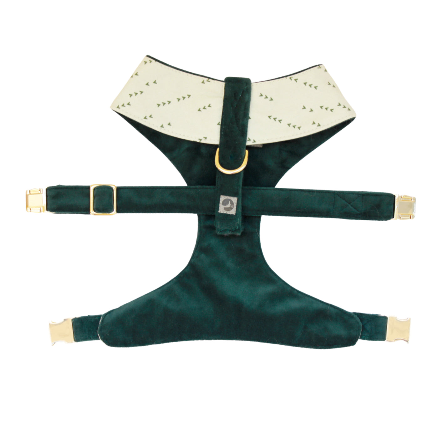 Top view of reversible dog harness with gold hardware in light green with dark green arrows