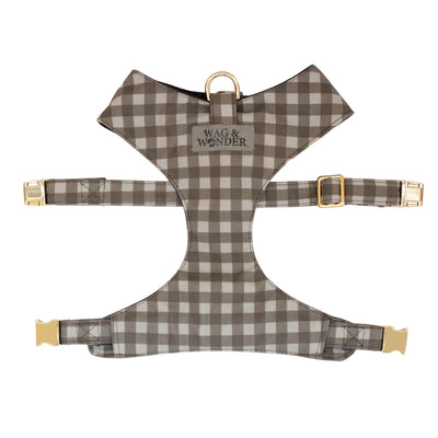 Front view of reversible dog harness with gold hardware in gray buffalo check