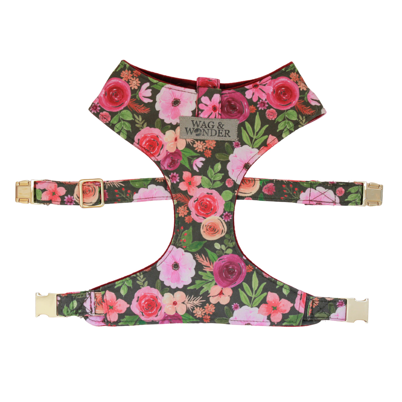 Front view of reversible dog harness with gold hardware in pink multi floral on gray