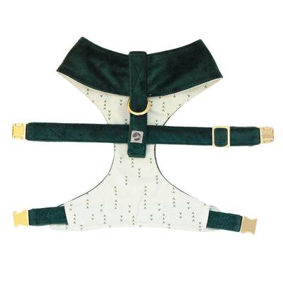 Top view of reversible dog harness with gold hardware in light green with dark green arrows