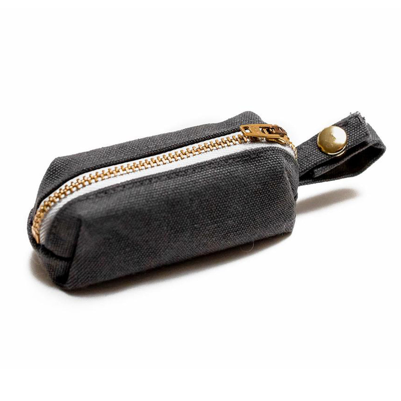 Side view of fabric rectangular pouch with zip closure and snap loop for poop bags in dark gray