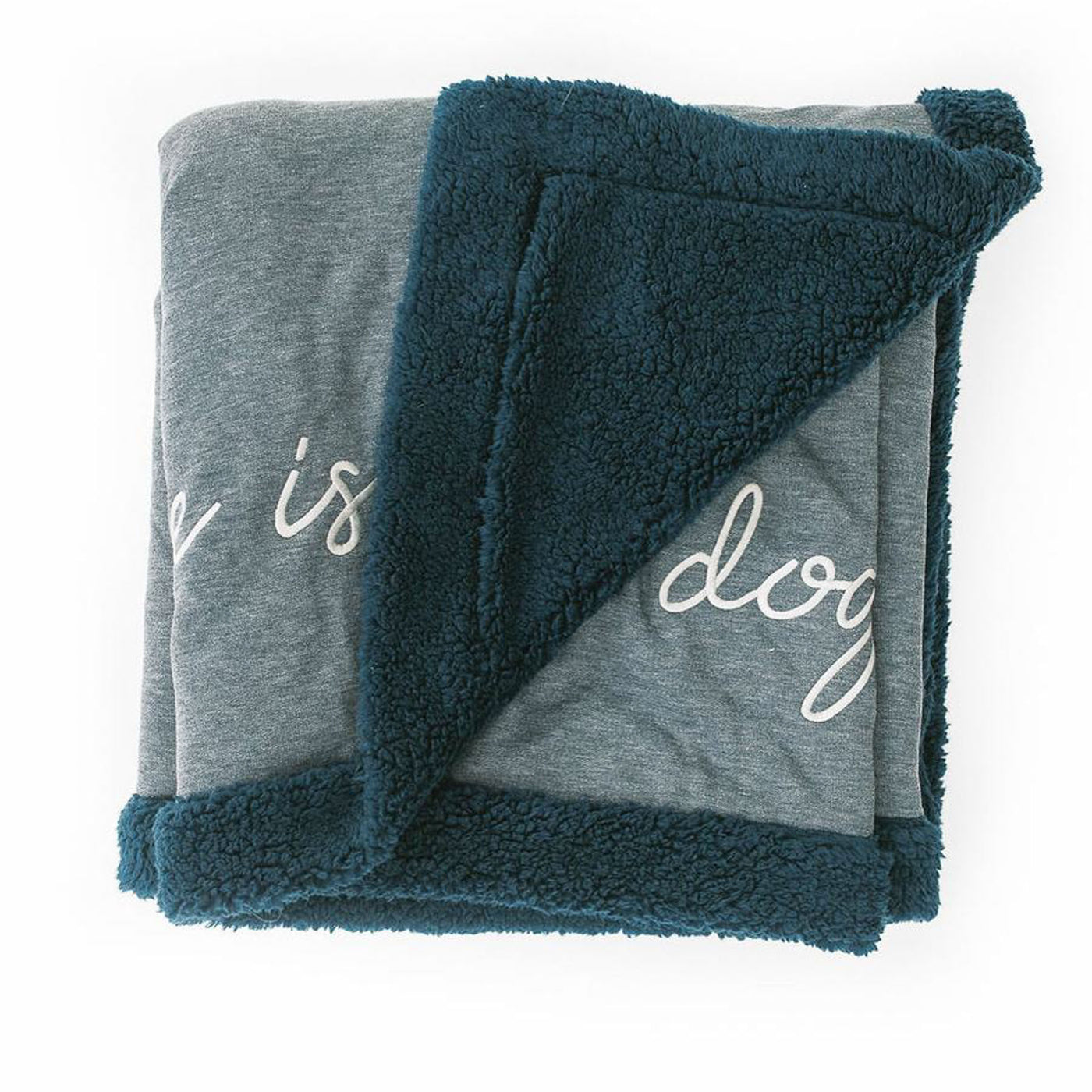 Navy Blue Fleece blanket with The Doggy Snuggle is Real embroidered on front and Sherpa back side folded with corner back