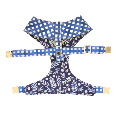 Top view of reversible dog harness with gold hardware in navy watercolor plaid